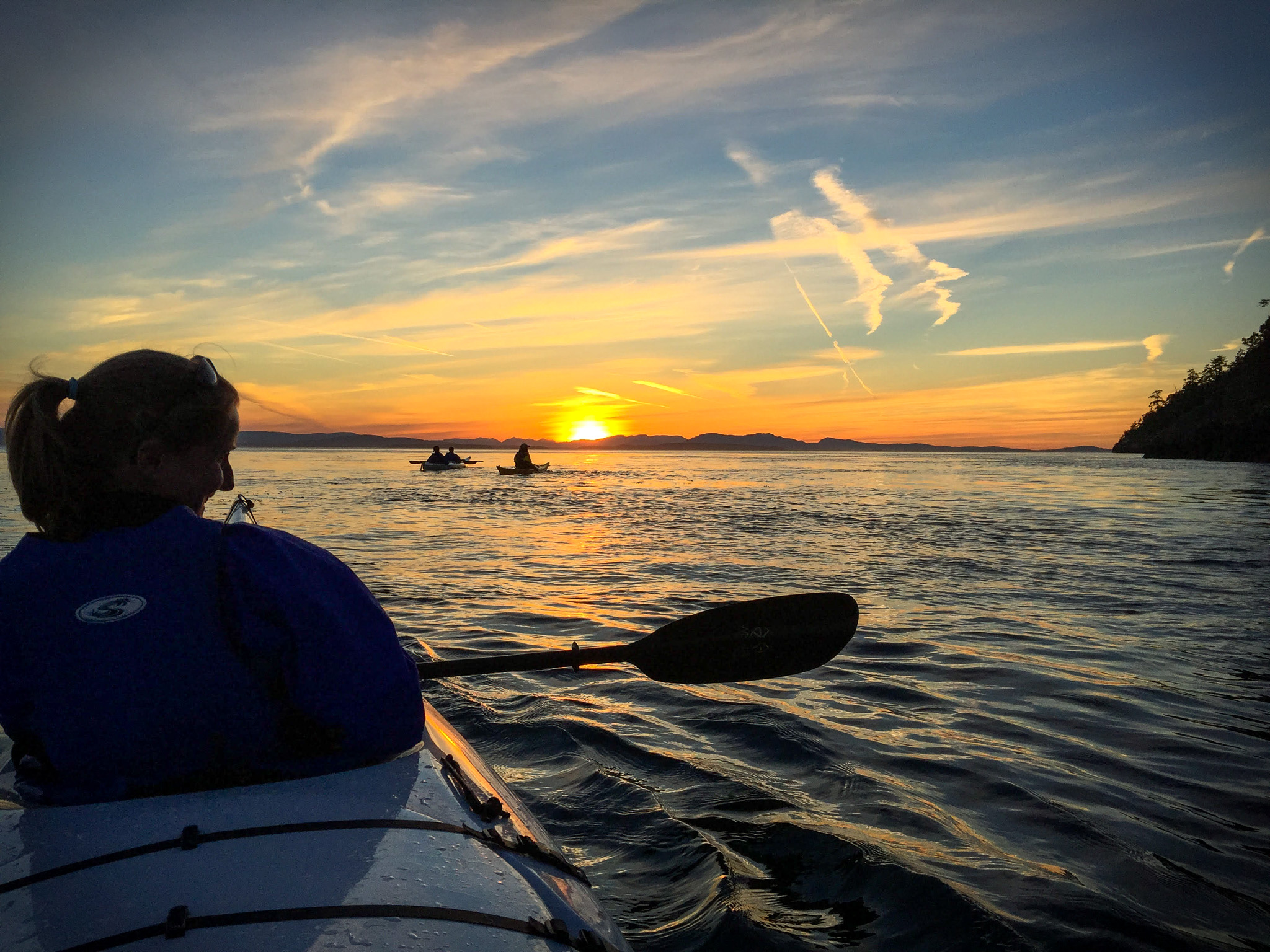 Sea kayaking sunset San Juan Islands Washington